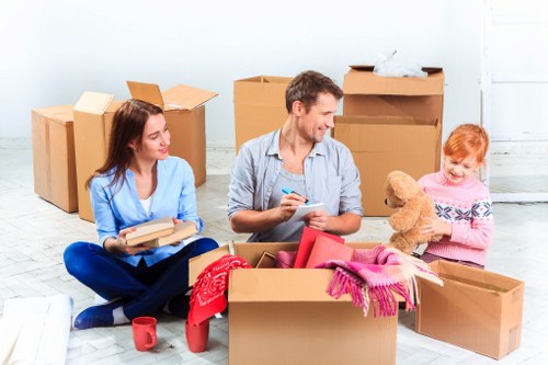 Careful moving of household items through an Islington property