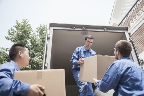 A moving crew following health and safety measures during transport
