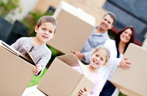 A local piano removals team handling a grand piano move
