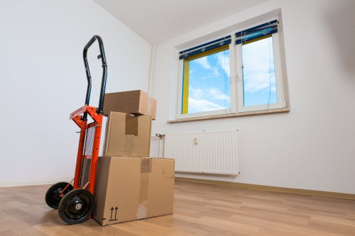Careful loading of household items during an Islington home relocation