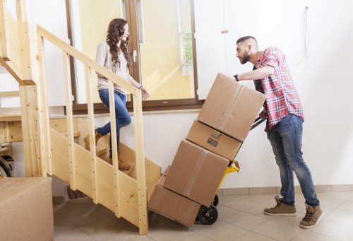 Careful loading of household items for a flat removal