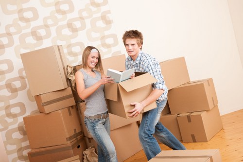Loading boxes and household items into a van for an Islington move