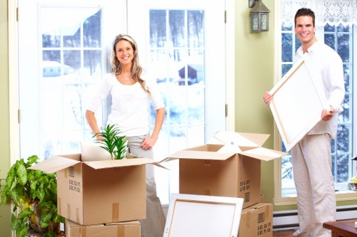 Prepared packed boxes and furniture for moving day in Islington