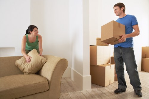 Local house removal team planning a move on an Islington street